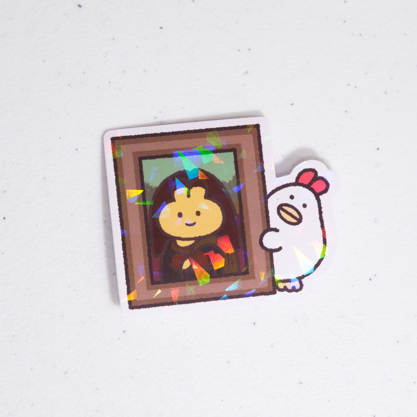 Sticker with a cartoon bunny Mona Lisa parody character in a frame and another chicken character holding it on a white background