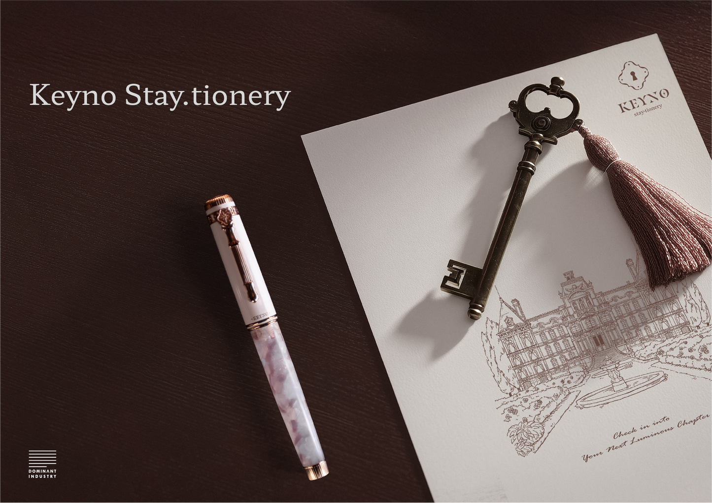 Fountain pen and decorative key on a piece of paper with 'Keyno Stay.tionery' branding.