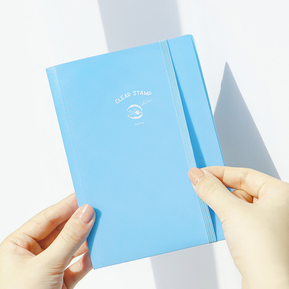 This folder from BGM includes 8 pockets which can store 8-16 clear stamps. Acrylic blocks can also be stored in the small folder with snap closure. This lightweight small file is perfect for travel or for everyday stationery backpack!