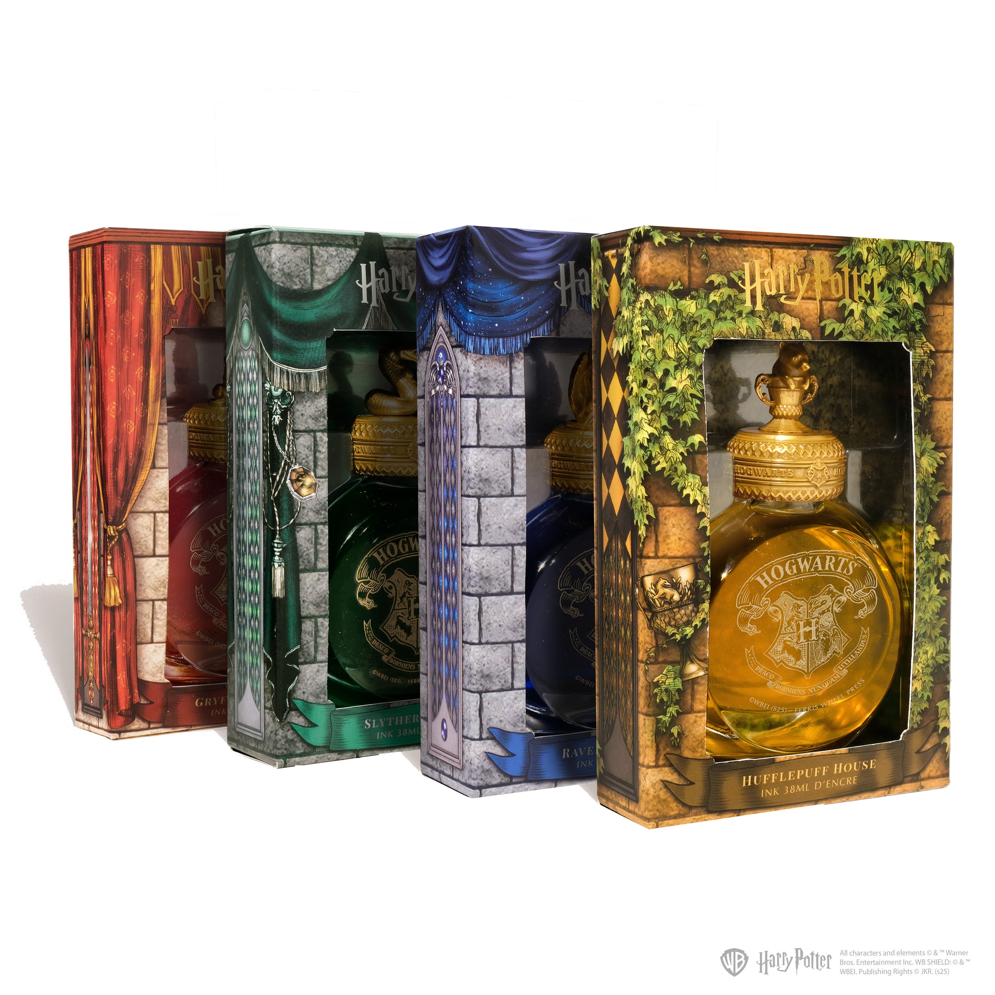 Set of Harry Potter-themed bottles in decorative boxes with castle and house design.
