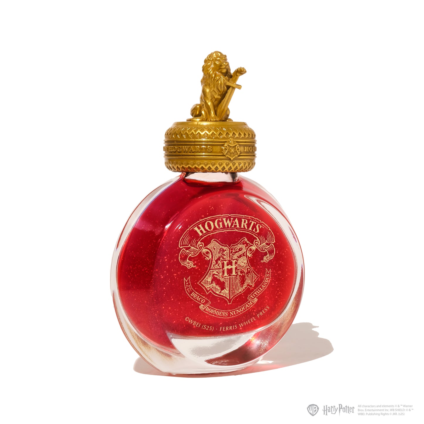 Red ink bottle with gold lion cap featuring Hogwarts crest on a white background