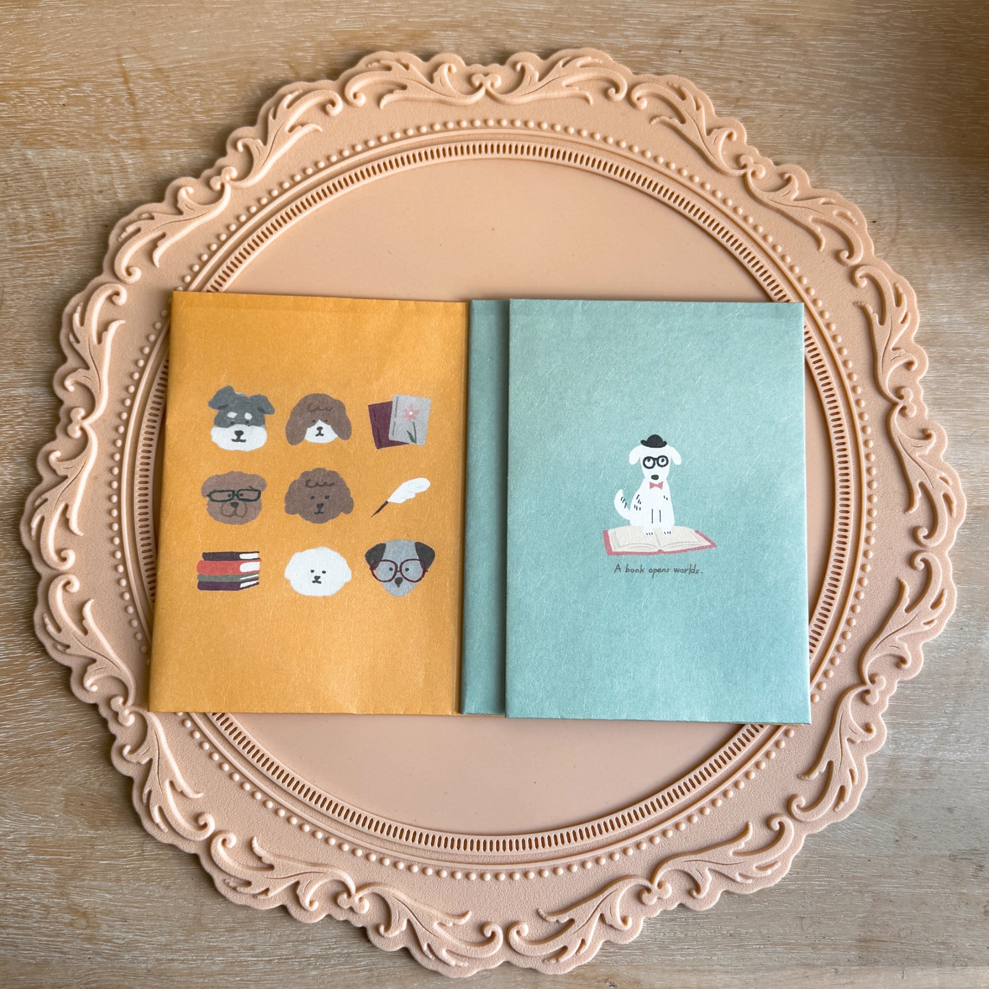 Set of two dog themed paper book covers with yellow and mint background