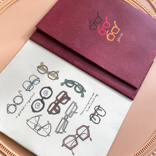 Closeup of two glasses themed paper book covers