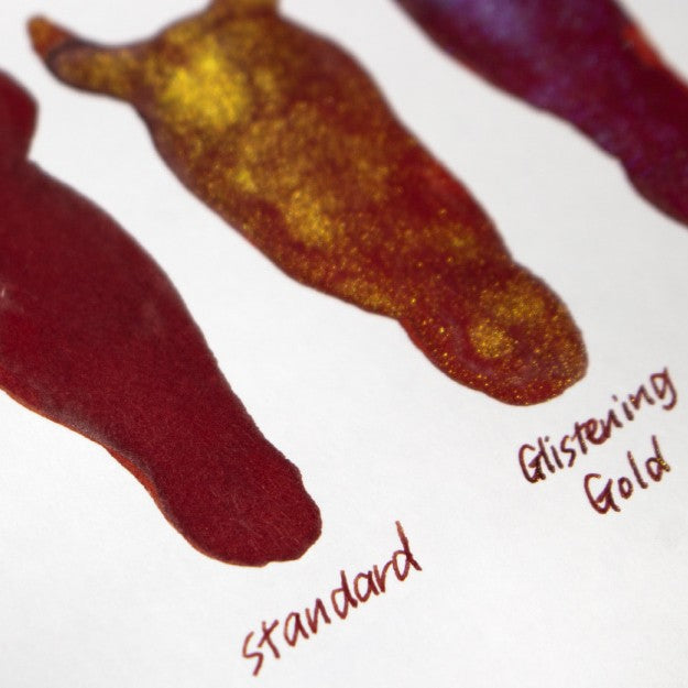 Two horse head-shaped swatches labelled 'Standard' and 'Glistening Gold' on a white background.