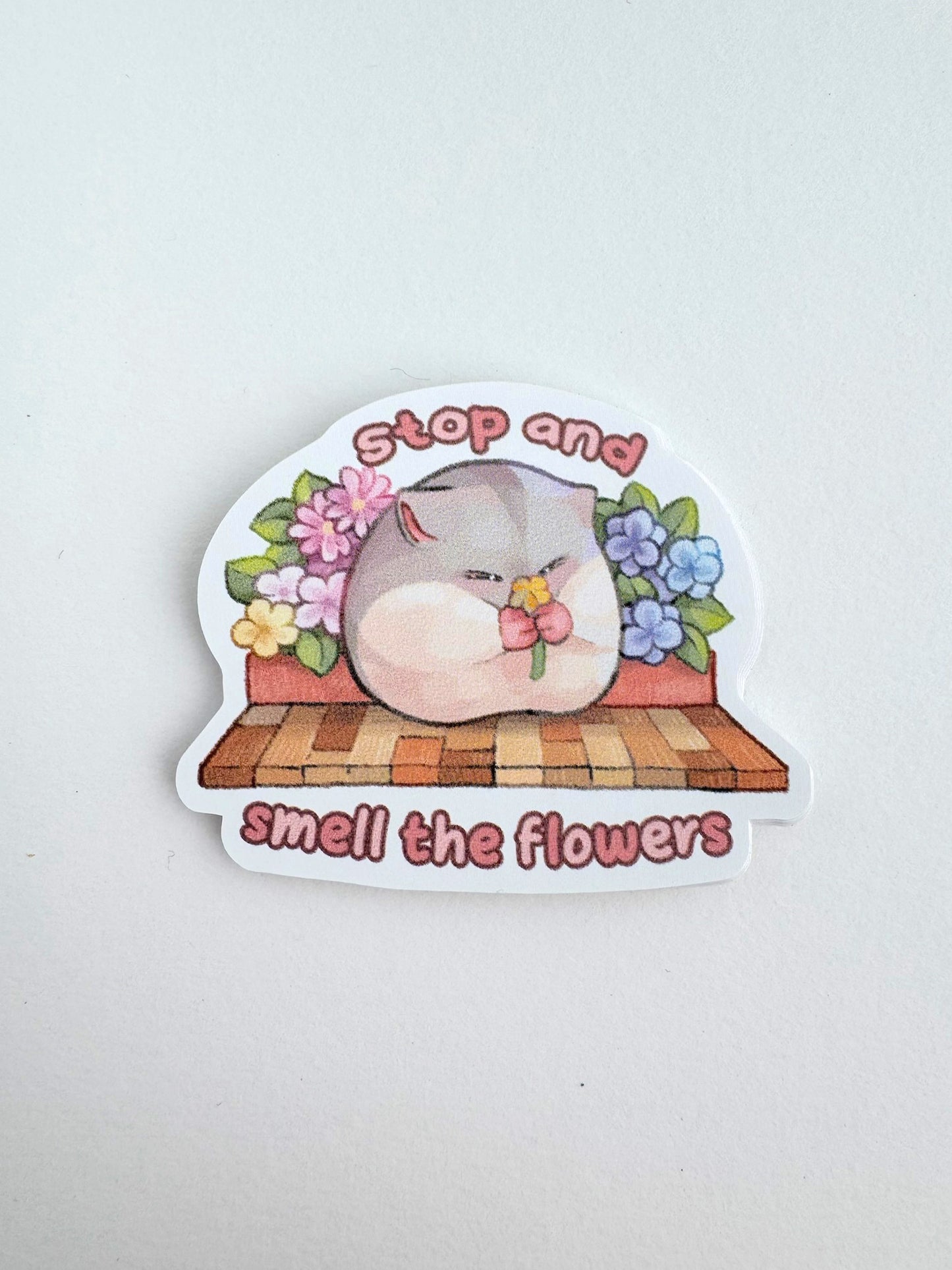 ‘Stop and smell the flowers’ Hamster Sticker