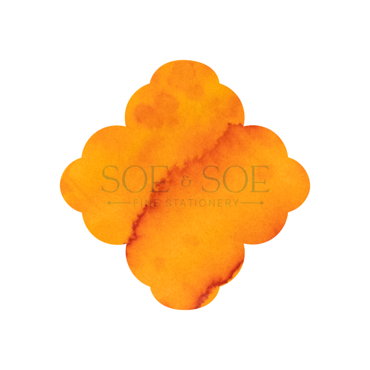 Orange flower-shaped ink swatch with 'SOE & SOE' branding on a white background