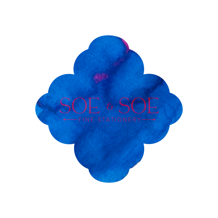 Blue flower-shaped ink swatch with 'SOE & SOE' branding on a white background