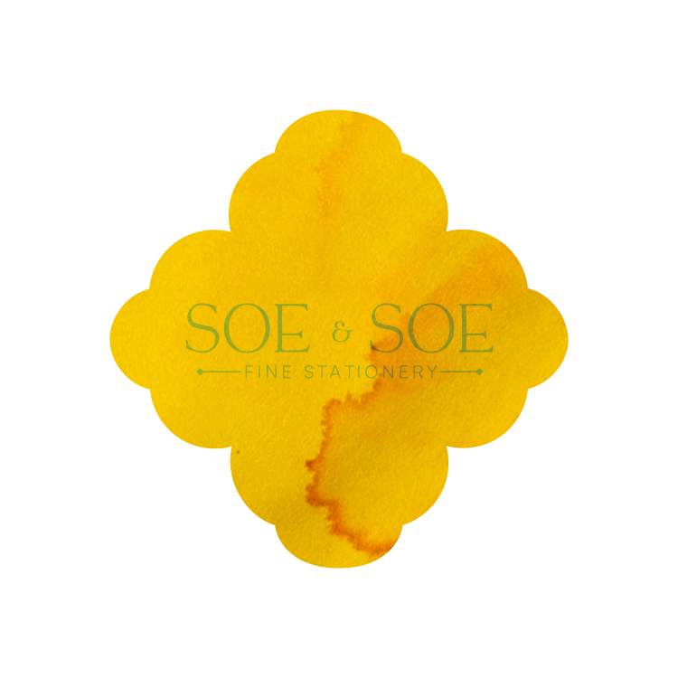 Yellow flower-shaped ink swatch with 'SOE & SOE' branding on a white background