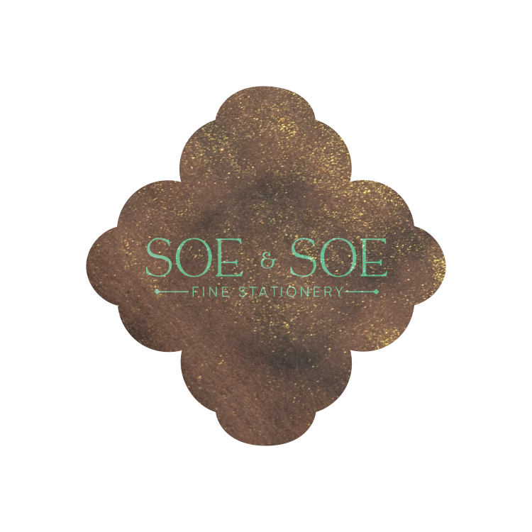 Decorative logo for SOE & SOE Fine Stationery with a brown ink swatch on a white background.