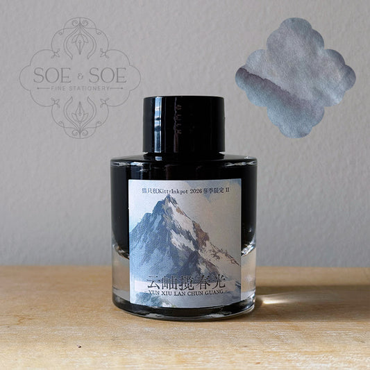 Clouds and Mountains Embrace the Spring Scenery