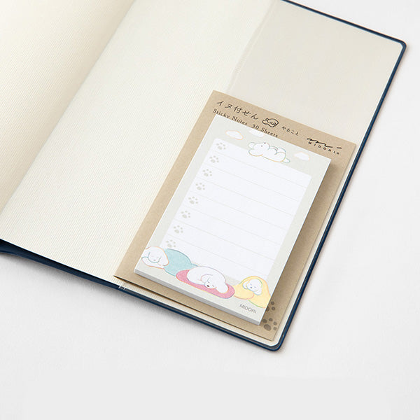 Packaged sticky notes with cartoon designs on a notebook