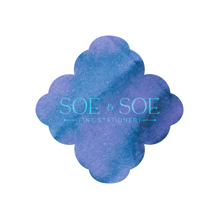 Blue and purple ink swatch with 'SOE & SOE Fine Stationery' text on a white background