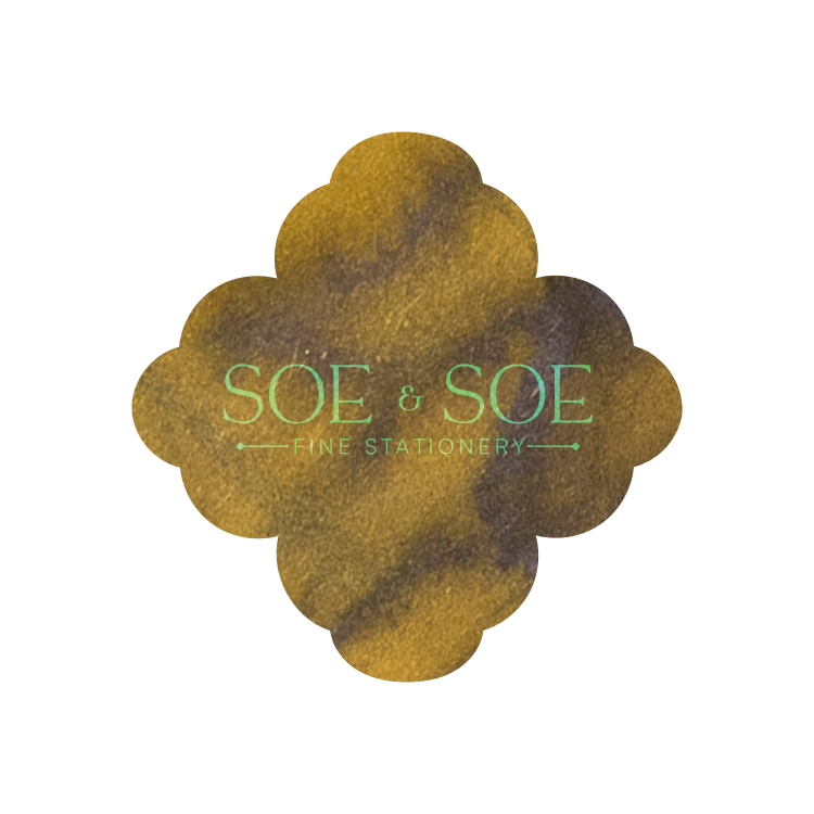 Floral-shaped ink swatch with 'SOE & SOE Fine Stationery' text on a white background
