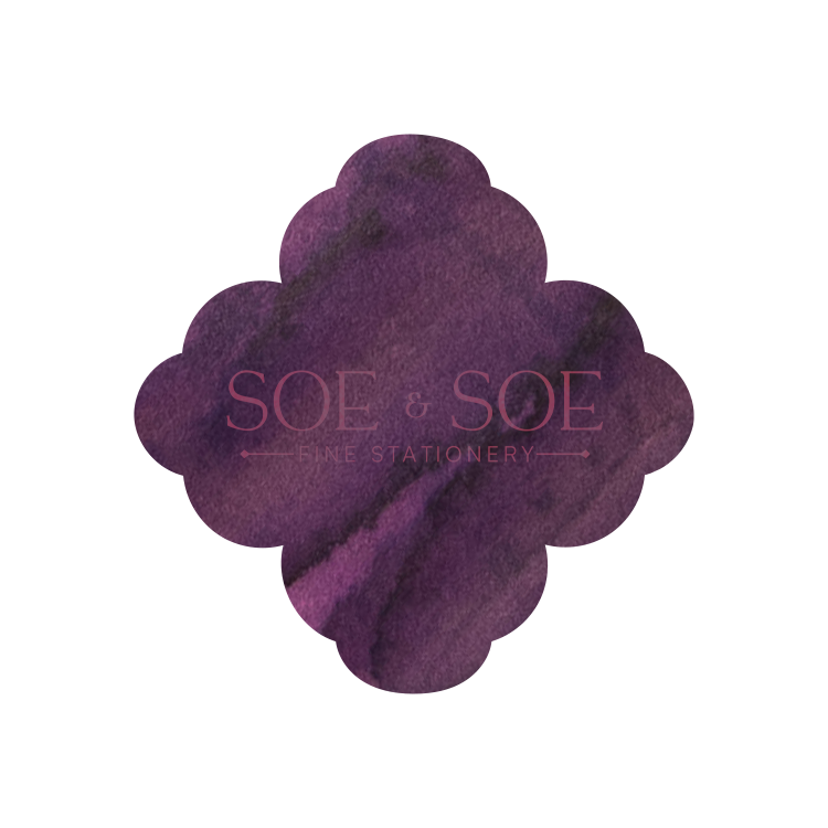 Yili ink swatch in the shape of the logo of SOE & SOE Fine Stationery  on a white background